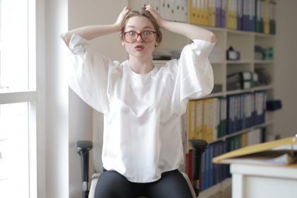 shocked female worker in modern workplace